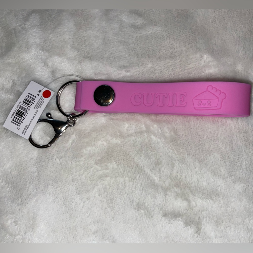 Snap wristlet. FREE with purchase.